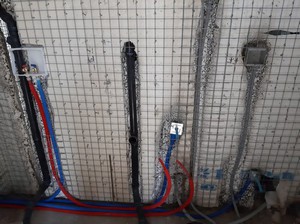 Pipe installation in panels